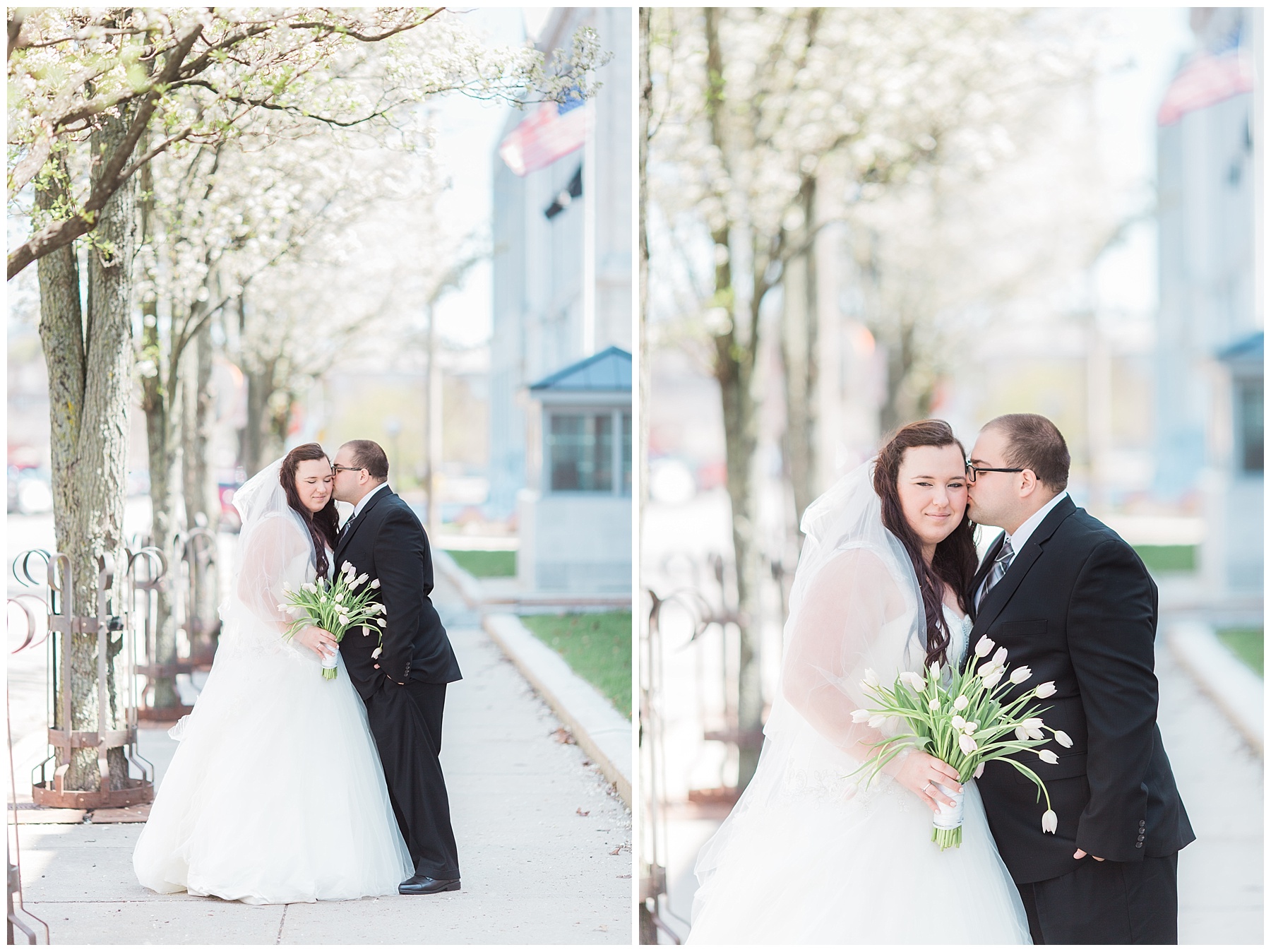 plus size couple in wedding attire taking wedding photos in downtown portland maine holding tulips