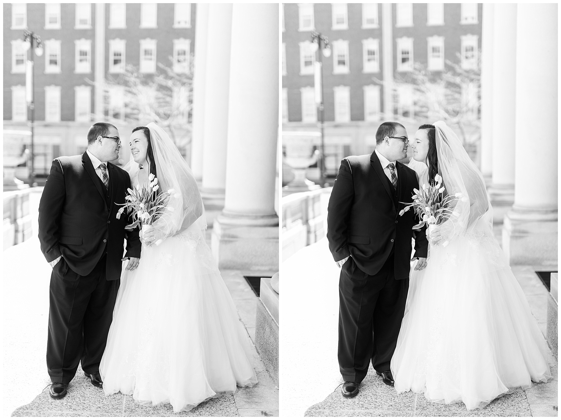 plus size couple in wedding attire taking wedding photos in downtown portland maine at city hall kissing holding tulips
