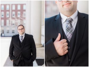 plus size couple in wedding attire taking wedding photos in downtown portland maine at city hall holding tulips