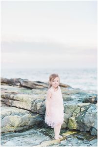 mommy and baby standing on the beach for a mommy and me session with her daughter with toddler